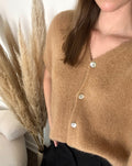 Gilet boutonné sans manches
